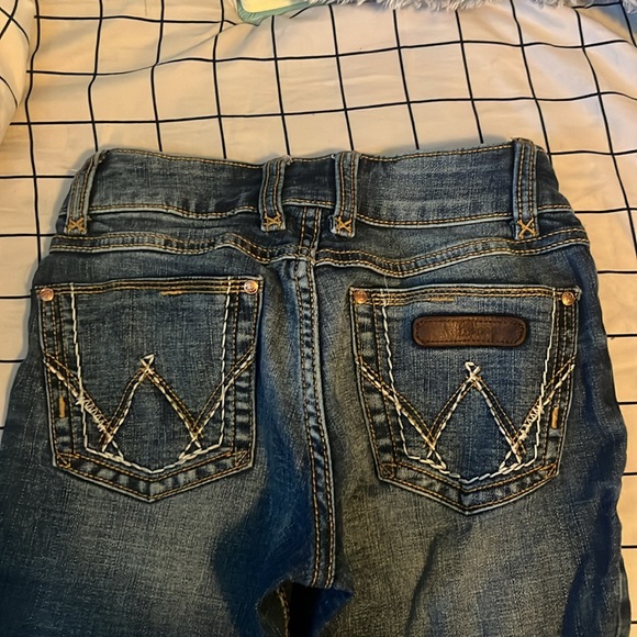 Brand new Wrangler bootcut jeans for sale!! 0/ 24-25in waist 34in length. - Picture 2 of 5